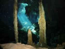 Stalactites and stalagmites in the Dos Ojos cave system i... by Kenn Bolbjerg 